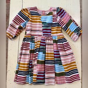 Pink chicken dress with bright stripey pattern in size 7